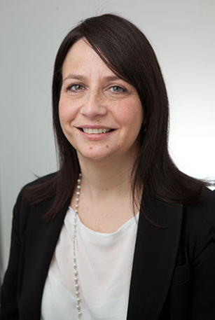 A portrait photograph of Carmel Walsh, one of the Solicitors acting in the breast implant scandal, at Pryers