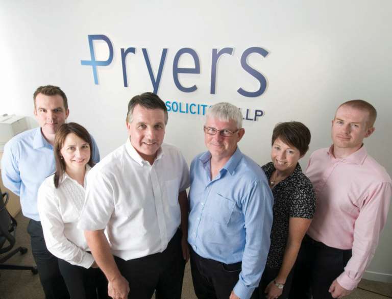 A photograph of the new partners at Pryers Solicitors, with Ian Pryer and Time Gorman