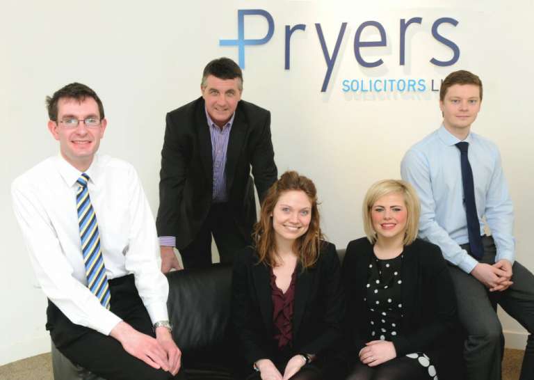 Pryers' trainees pictured with Ian Pryer and two of their newly qualified solicitors