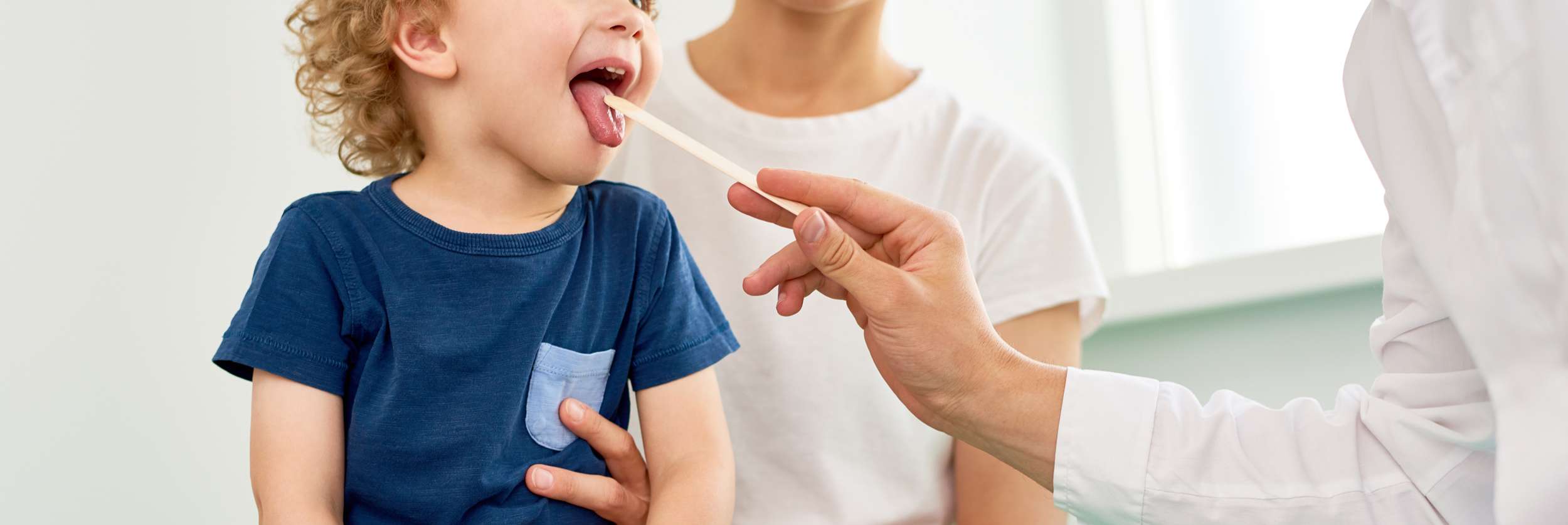 young boy visiting pediatrician