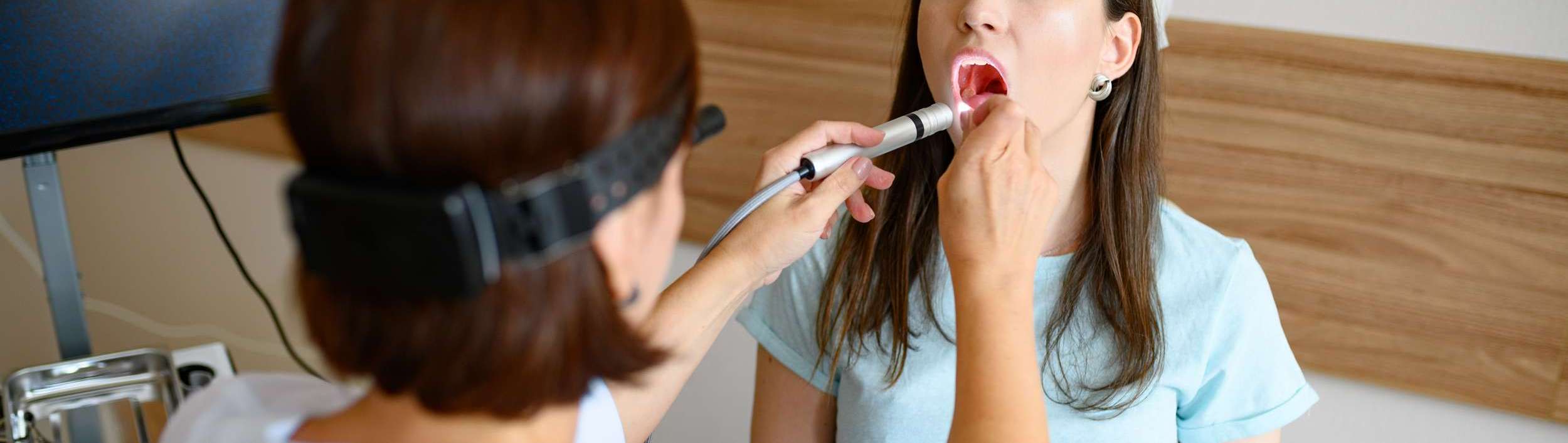 female doctor and patient in office exam