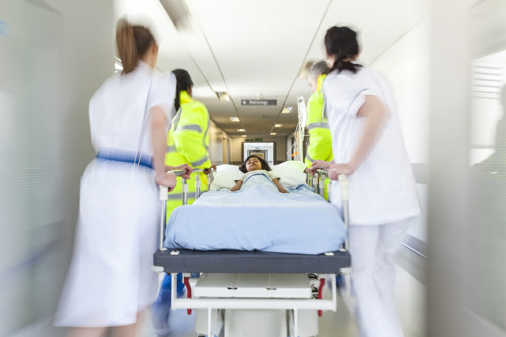 A photo showing a trolley being wheeled through Accident and Emergency to depict how A&E misdiagnosis is a serious problem.