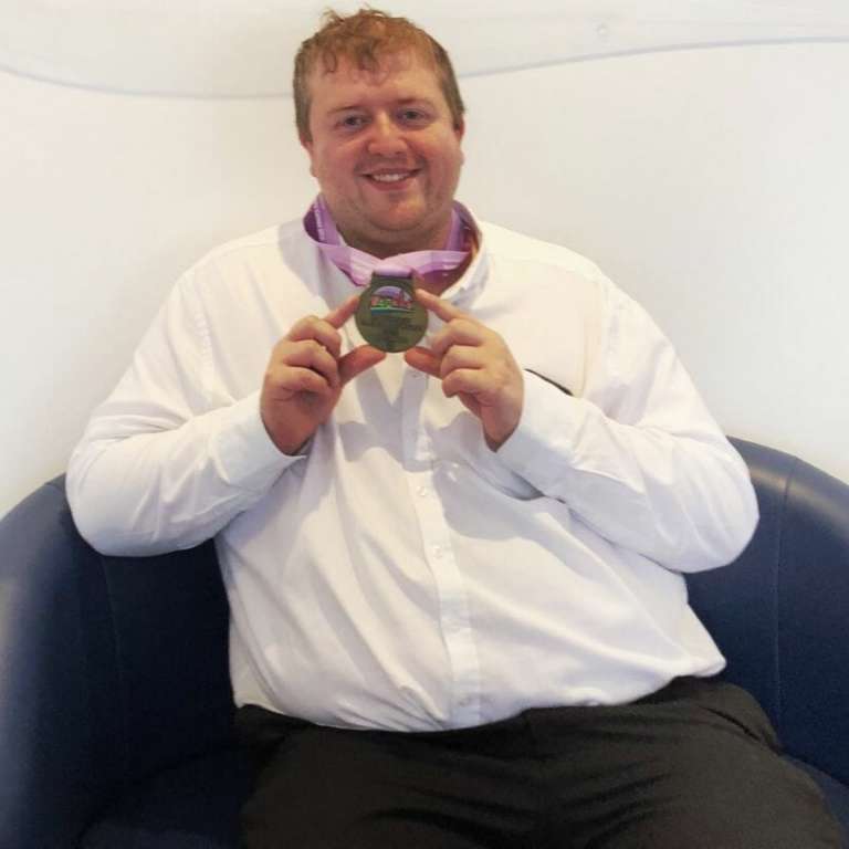 Mark Mason with his gold medal from the Special Olympics - Pryers' very own Olympic hero