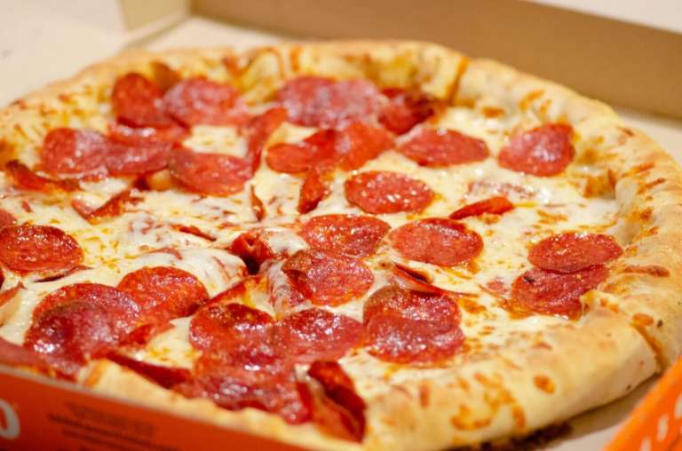 A photograph of a takeaway pizza, because part of the focus on prevention to tackle NHS issues is helping people make better decisions towards living a healthier lifestyle.