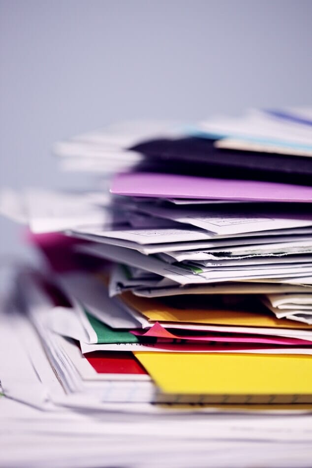 A photograph of a pile of papers to depict the NHS Resolution annual report 2019/20