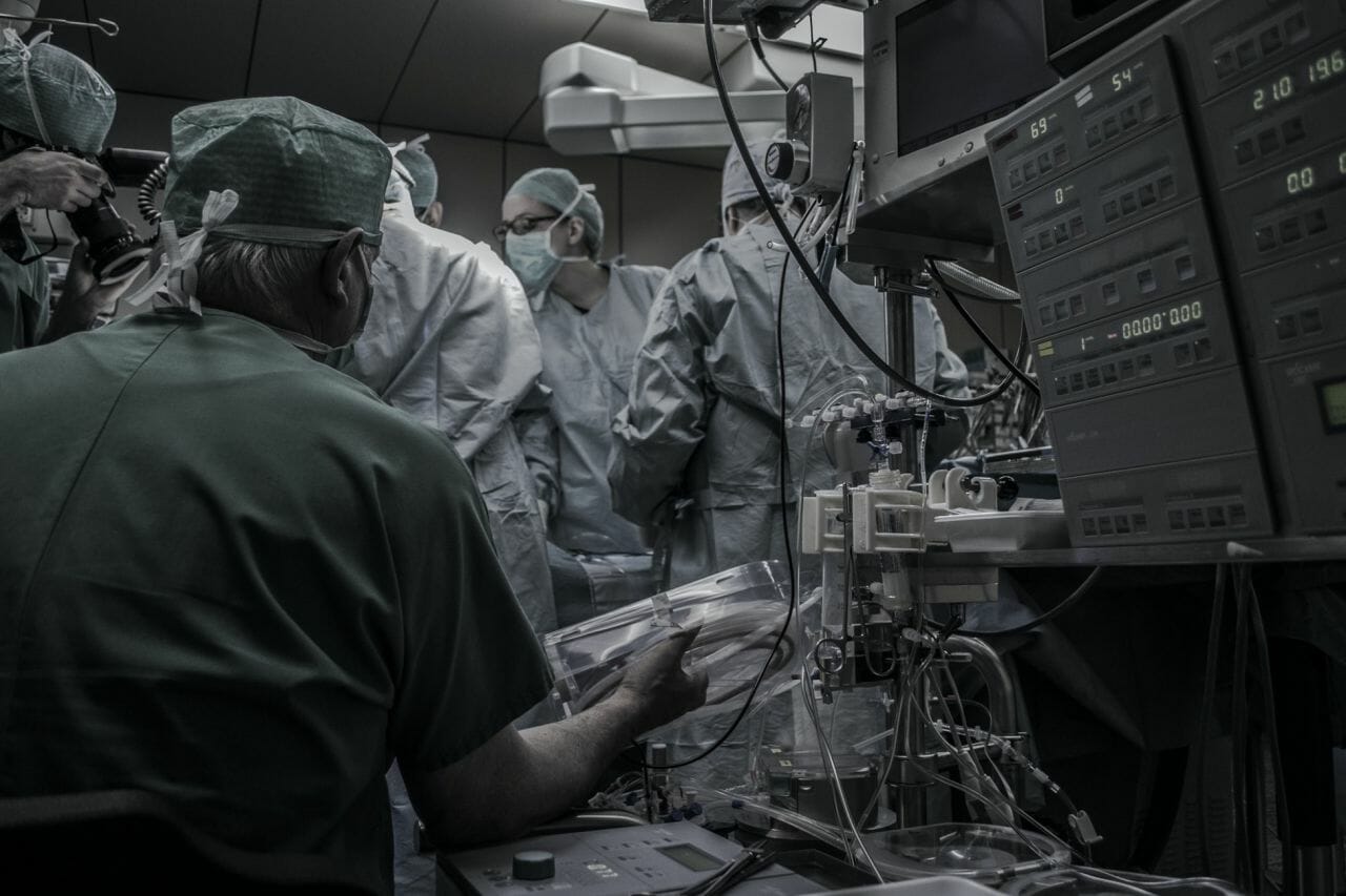 A black and white photograph of an operating theatre. Mr Daniel Hay is accused of causing unnecessary harm in surgeries like this.