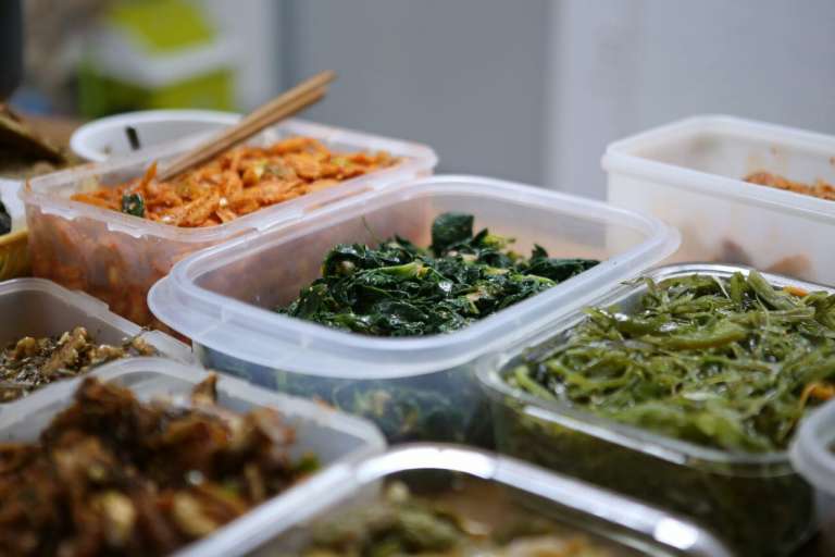 A photograph showing a variety of foods in separate containers to accompany an article about free school dinners for children in school holidays.